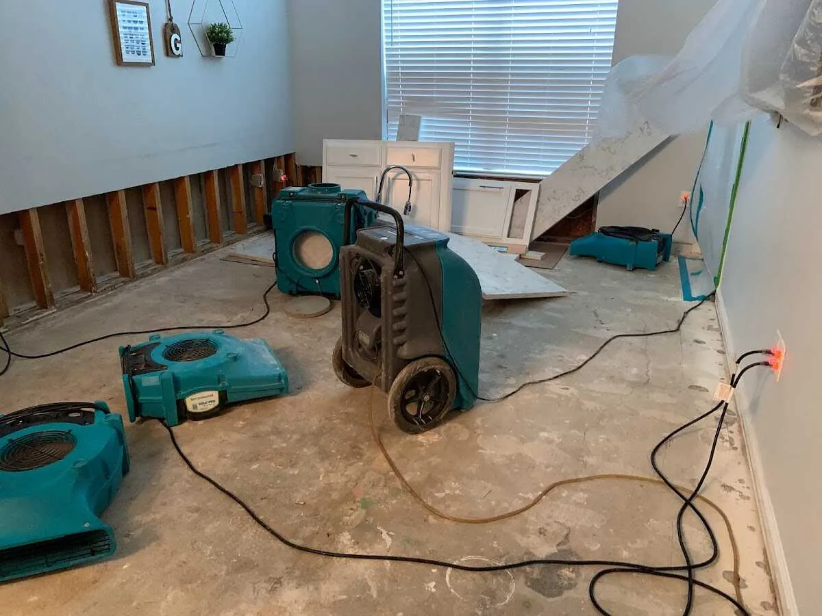 Dehumidifier in flood-cut room for Water Damage Restoration in Middlebury